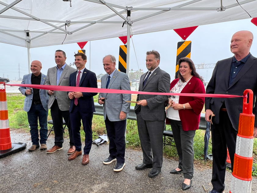 pecue ribbon cutting